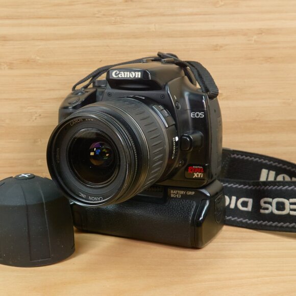 Canon EOS Rebel XTi (400D) Digital 10.1 MP Camera, w/ 18-55mm Lens, Battery Grip - Picture 1 of 11